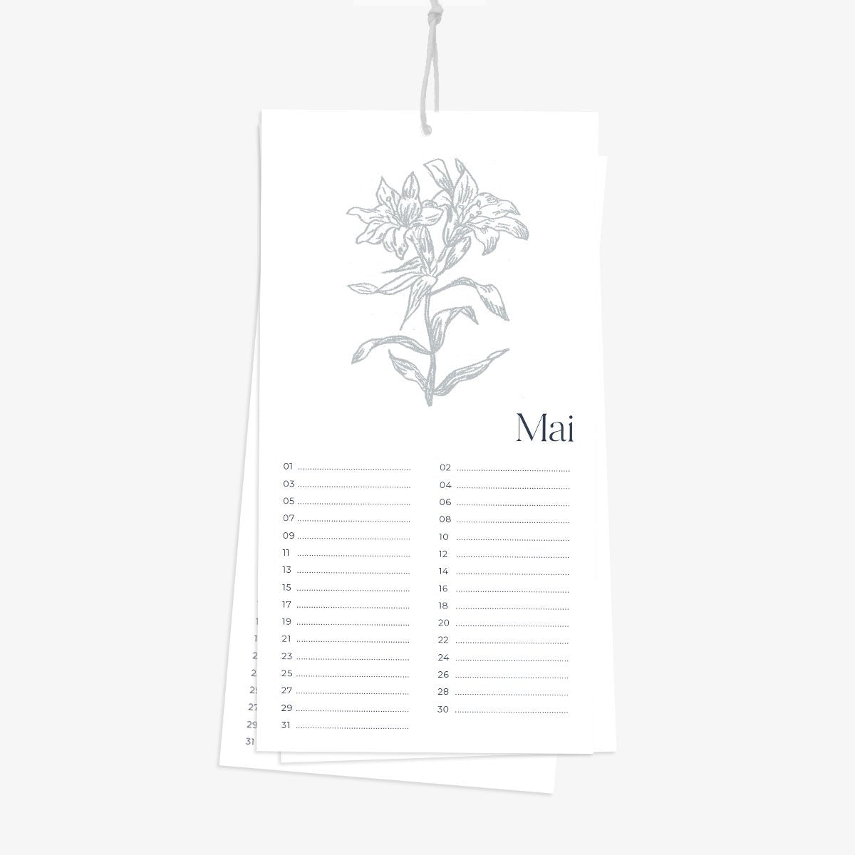 calendrier avec fleur bleue sur page mai