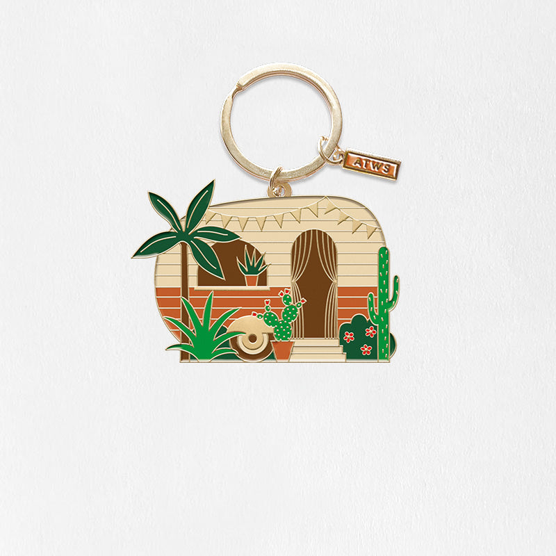 Porte clef avec une caravane beige, or et vert et des plantes style boheme